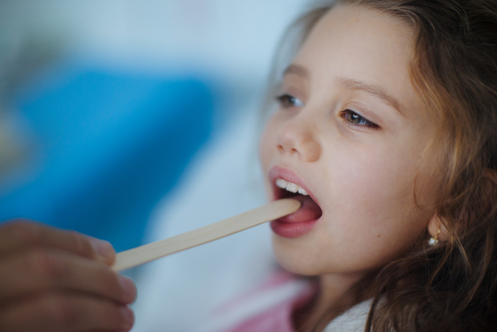 Can you have strep throat without a fever? Signs to watch for